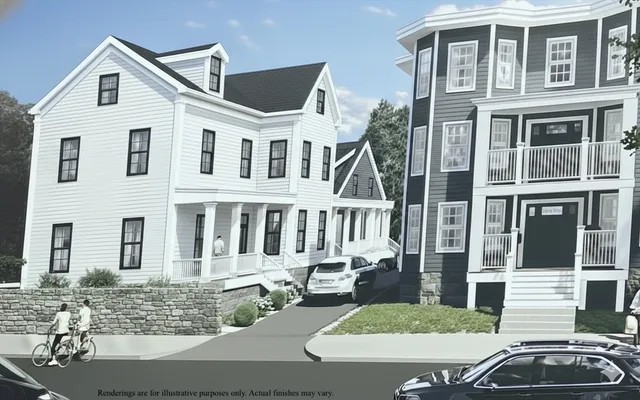 a front view of a large white building