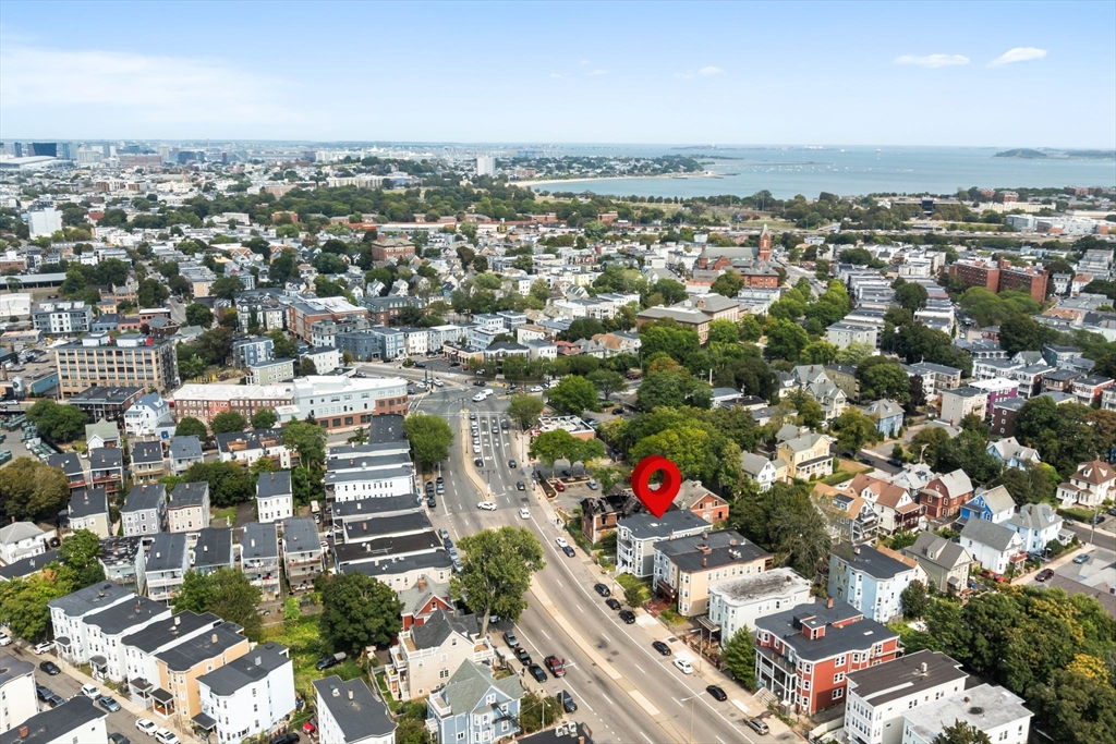 679-683 Columbia Road, Unit 1 Boston, MA 02125 - Photo 31 of 31 an aerial view of residential building with city view