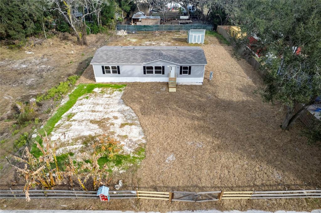 12396 Hicks Road Hudson, FL 34669 - Photo 11 of 33 a aerial view of a house with a yard