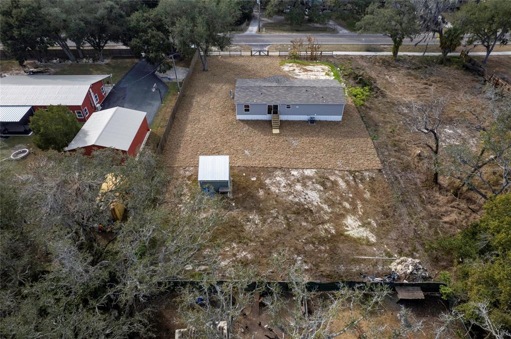 12396 Hicks Road Hudson, FL 34669 - Photo 15 of 33 an aerial view of a house with outdoor space