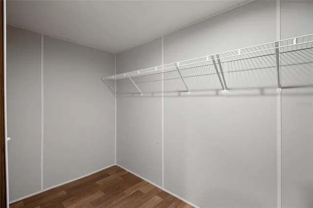 a view of a room with racks on the wall