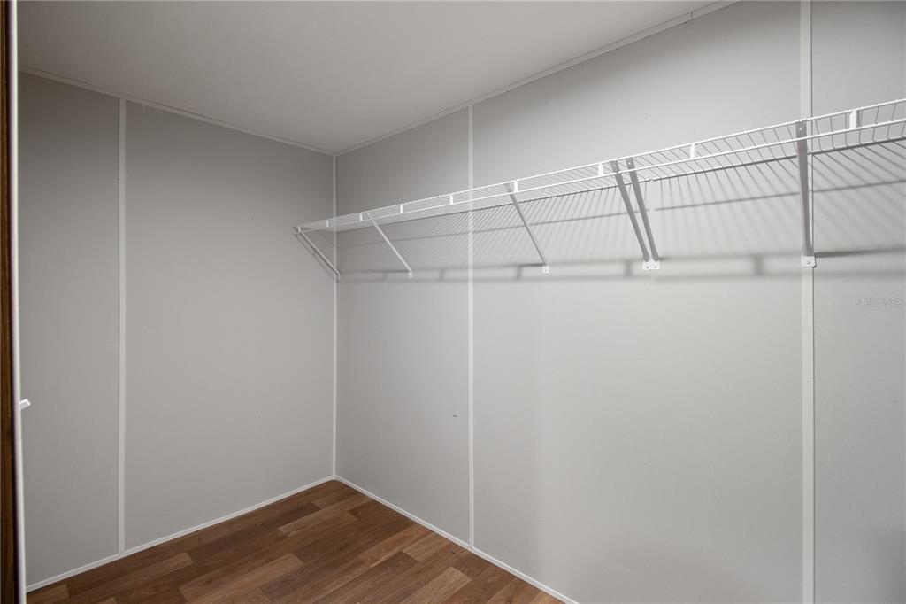 12396 Hicks Road Hudson, FL 34669 - Photo 33 of 33 a view of a room with racks on the wall