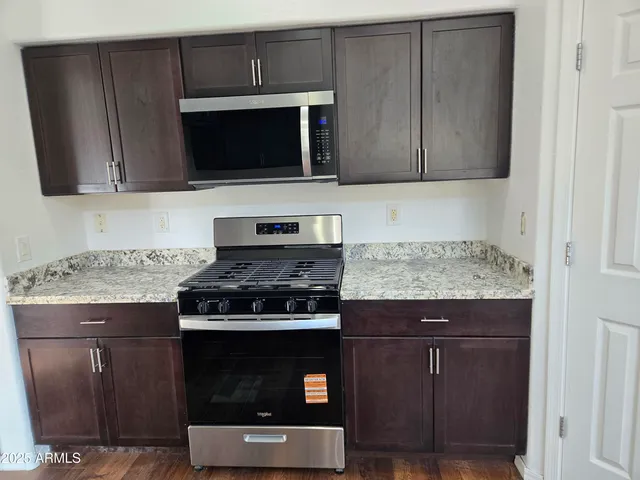 a kitchen with a sink and a cabinets