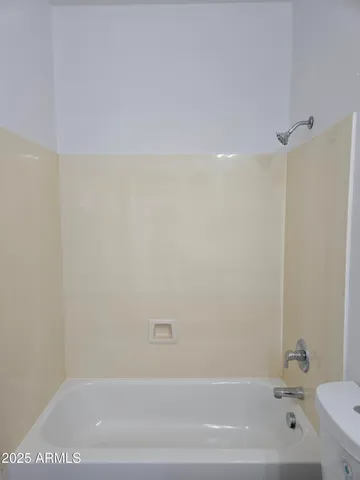 an empty room with an entryway