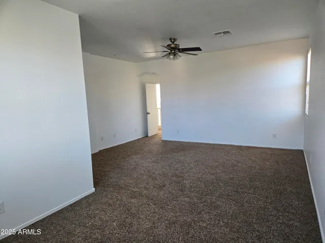 a bathroom with a double vanity sink and mirror