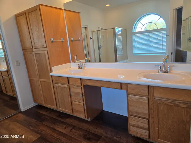 a view of a room with rack on the wall and a window