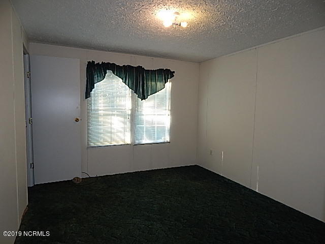 352 Pilchers Branch Road Holly Ridge, NC 28445 - Photo 19 of 39 Front Corner Bedroom