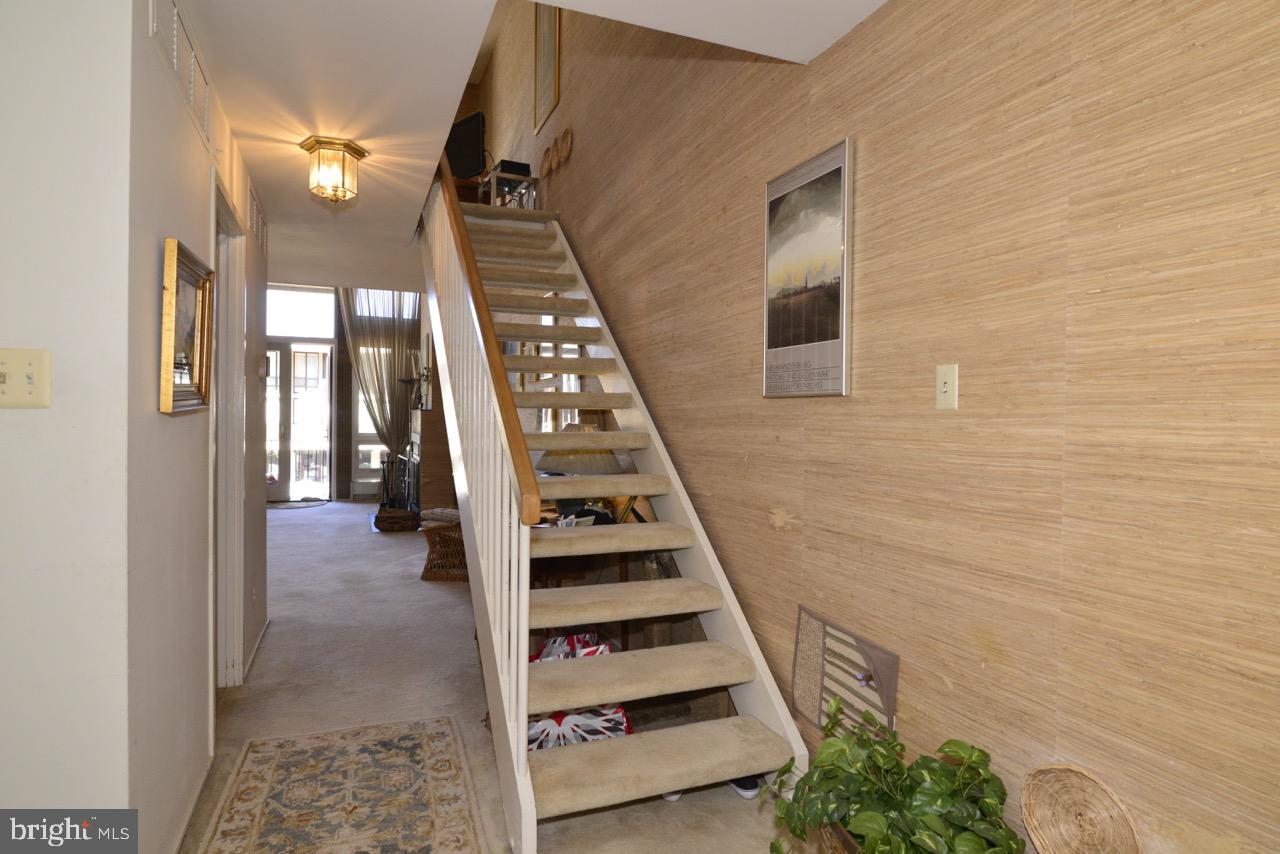1656 Chimney House Road, Unit 1656 Reston, VA 20190 - Photo 7 of 32 Front Hallway