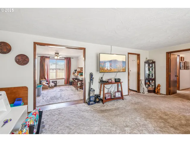 a view of game room with window and couch