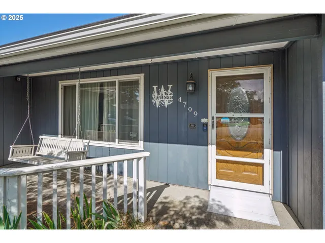 a front view of a house with a porch