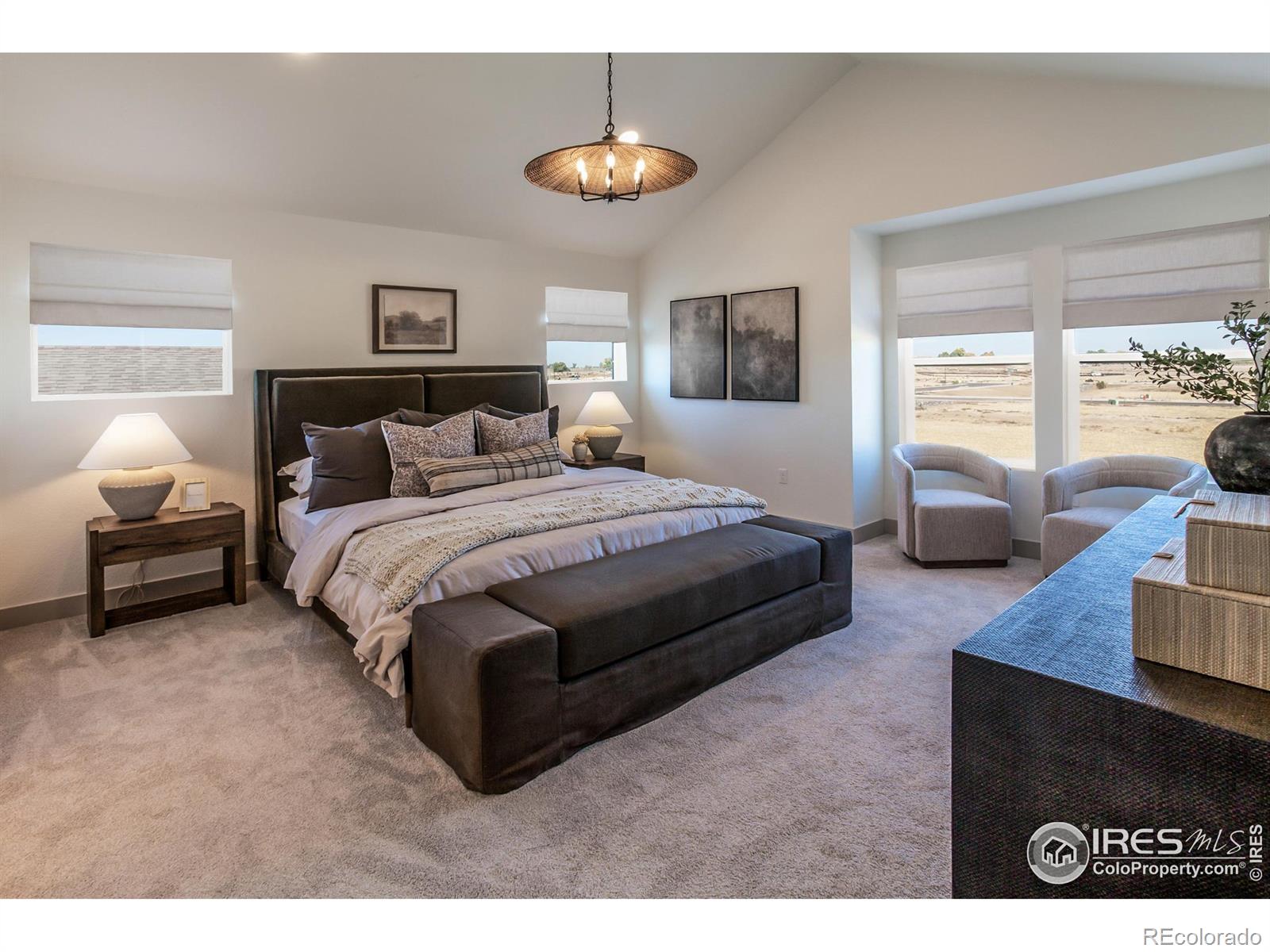 6079 Red Barn Road Fort Collins, CO 80528 - Photo 22 of 41 a bedroom with a bed and a couch