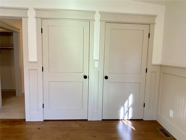 a bathroom with a sink vanity and mirror
