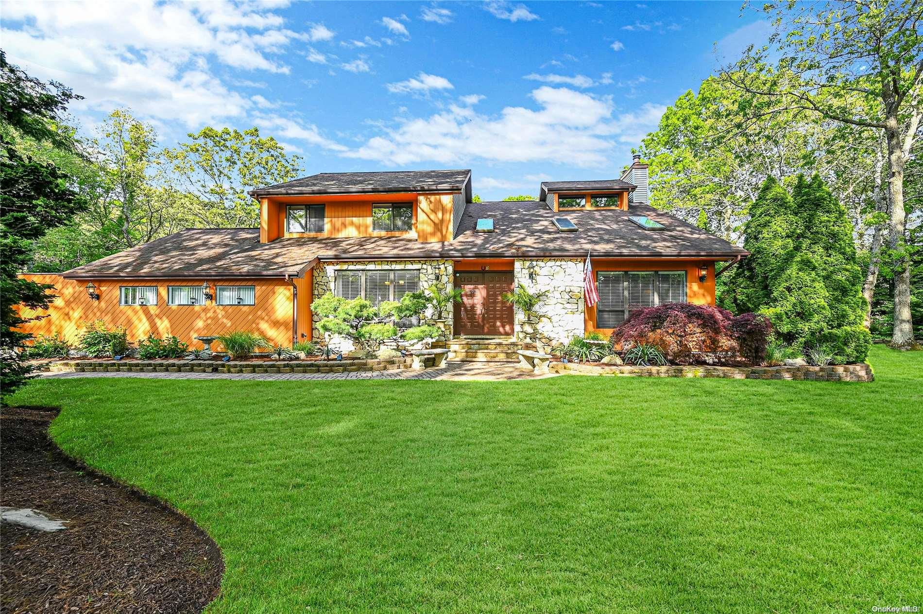 3 Jenny Path Medford, NY 11763 - Photo 1 of 1 a front view of house with yard and outdoor seating