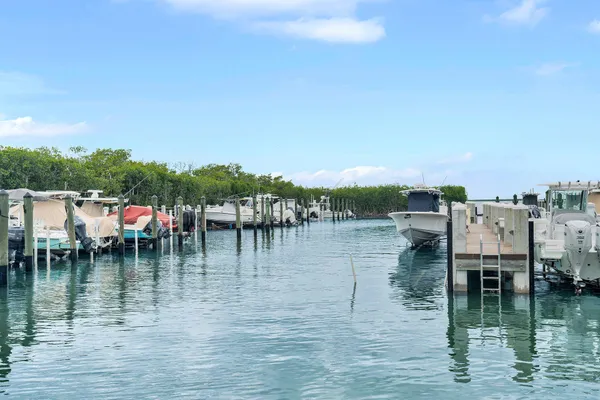 $699,000 | 98202 Windward Avenue, Unit CONDO W/ 30 FT BOAT SLIP, Key Largo, FL 33037