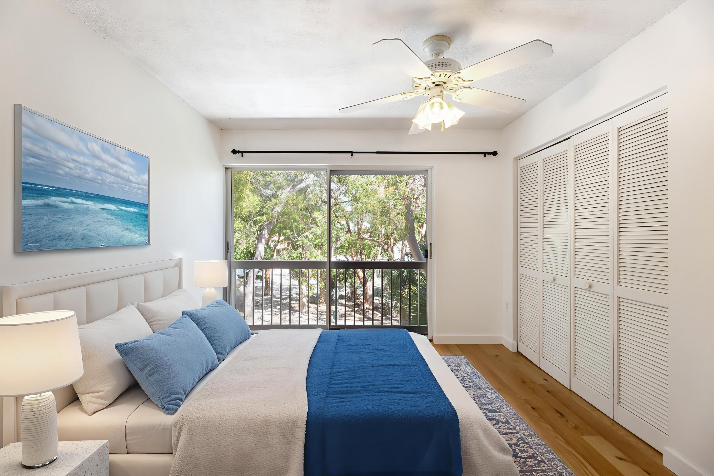 98202 Windward Avenue, Unit CONDO W/ 30 FT BOAT SLIP Key Largo, FL 33037 - Photo 28 of 36 Primary Bedroom