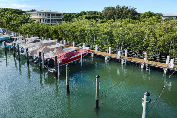$699,000 | 98202 Windward Avenue, Unit CONDO W/ 30 FT BOAT SLIP, Key Largo, FL 33037