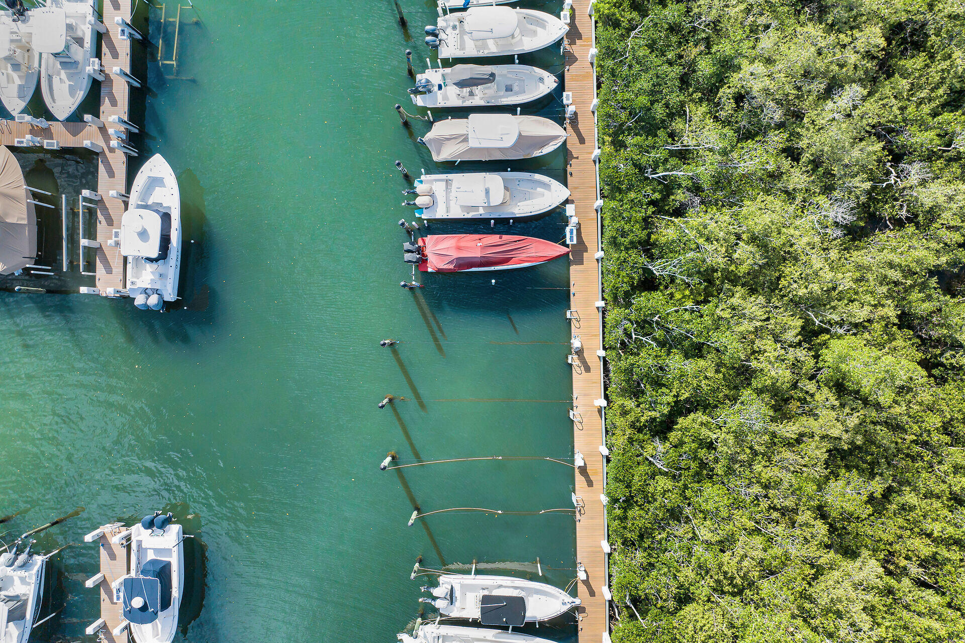 98202 Windward Avenue, Unit CONDO W/ 30 FT BOAT SLIP Key Largo, FL 33037 - Photo 5 of 36 an aerial view of a residential houses with outdoor space