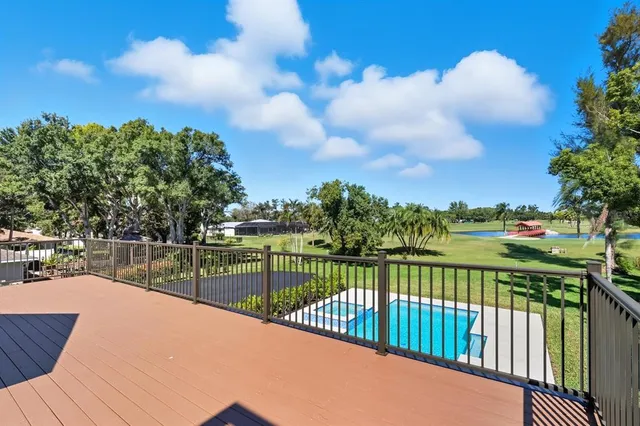 an aerial view of a house with a garden