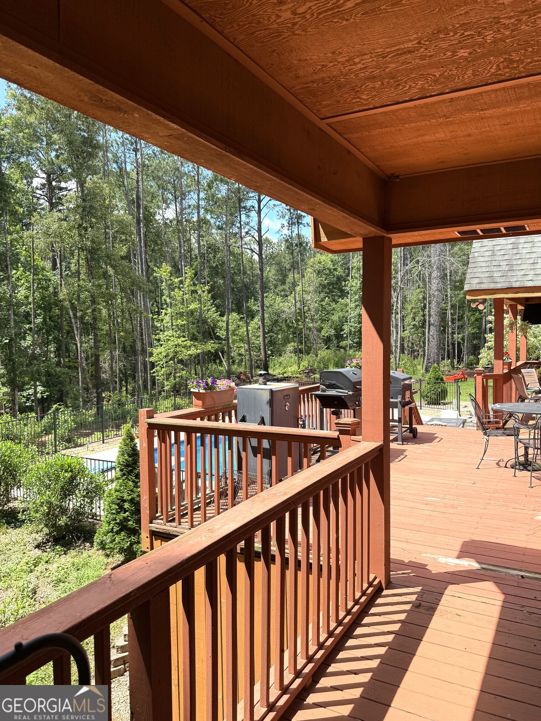 725 Musgrove Road Griffin, GA 30223 - Photo 40 of 52 a view of balcony with chairs