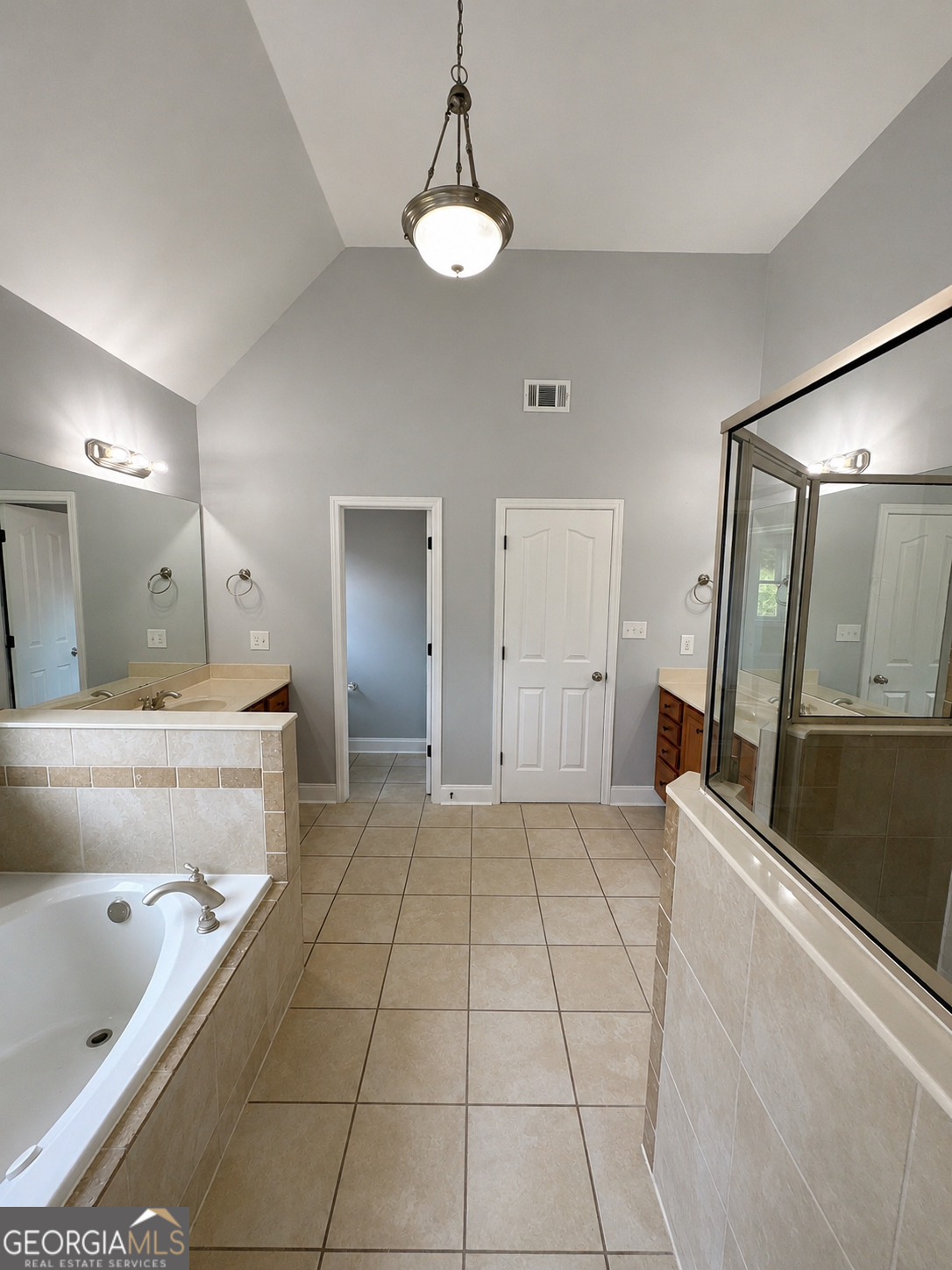 2614 Dolostone Way Dacula, GA 30019 - Photo 18 of 29 a bathroom with a sink a toilet and mirror