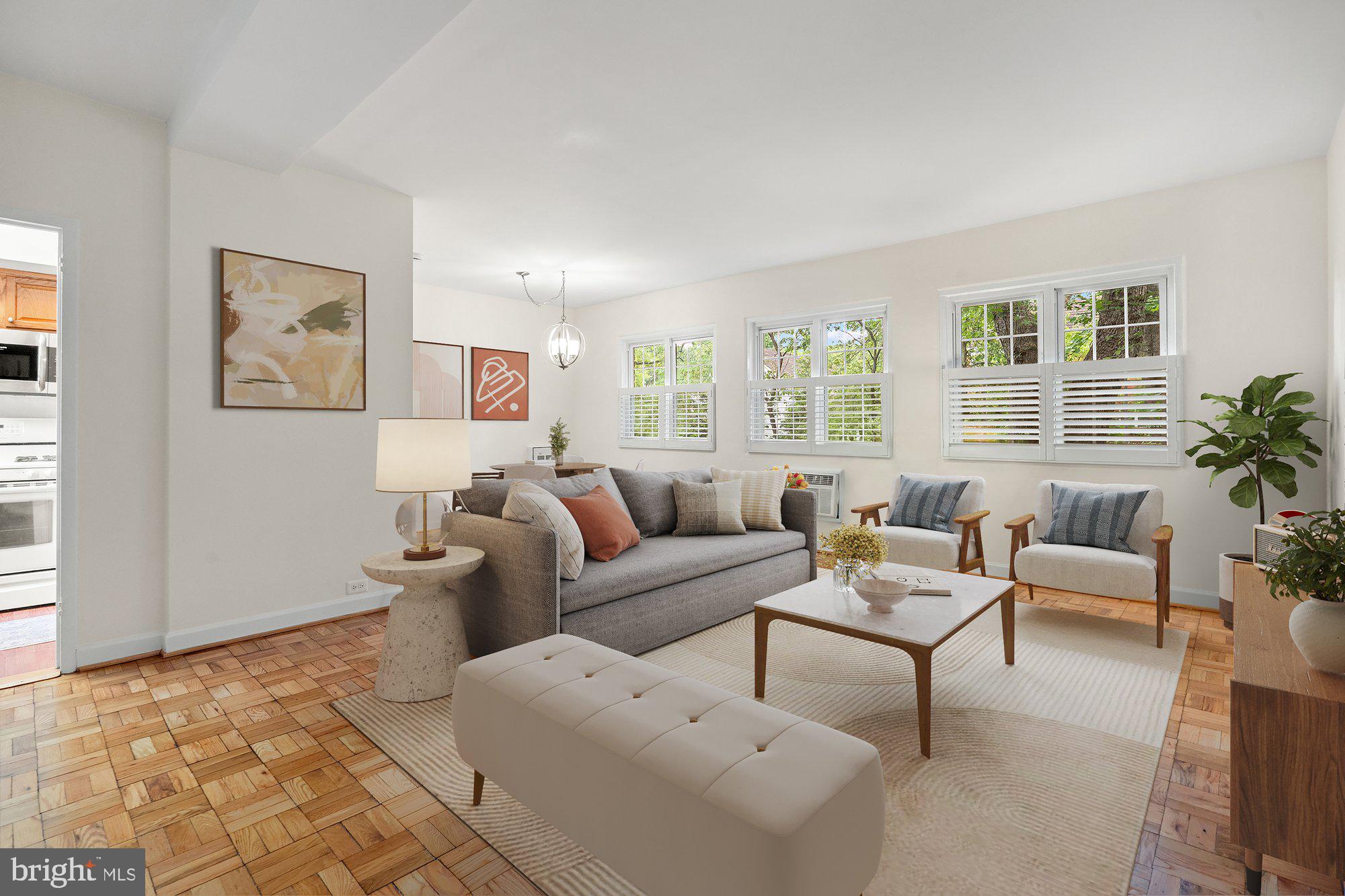 3304 Gunston Road Alexandria, VA 22302 - Photo 2 of 28 a living room with furniture and a potted plant