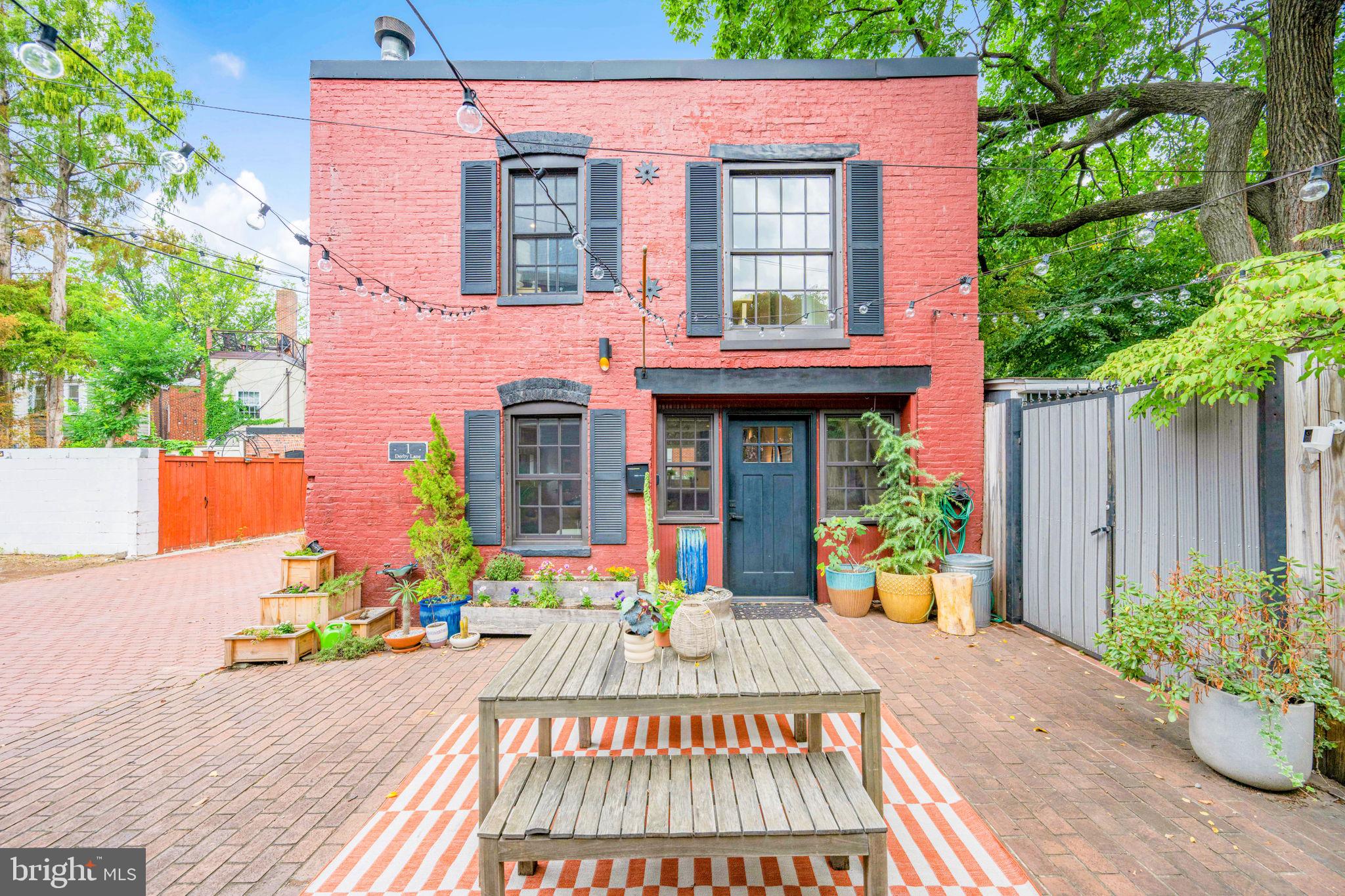 a front view of a house with outdoor space