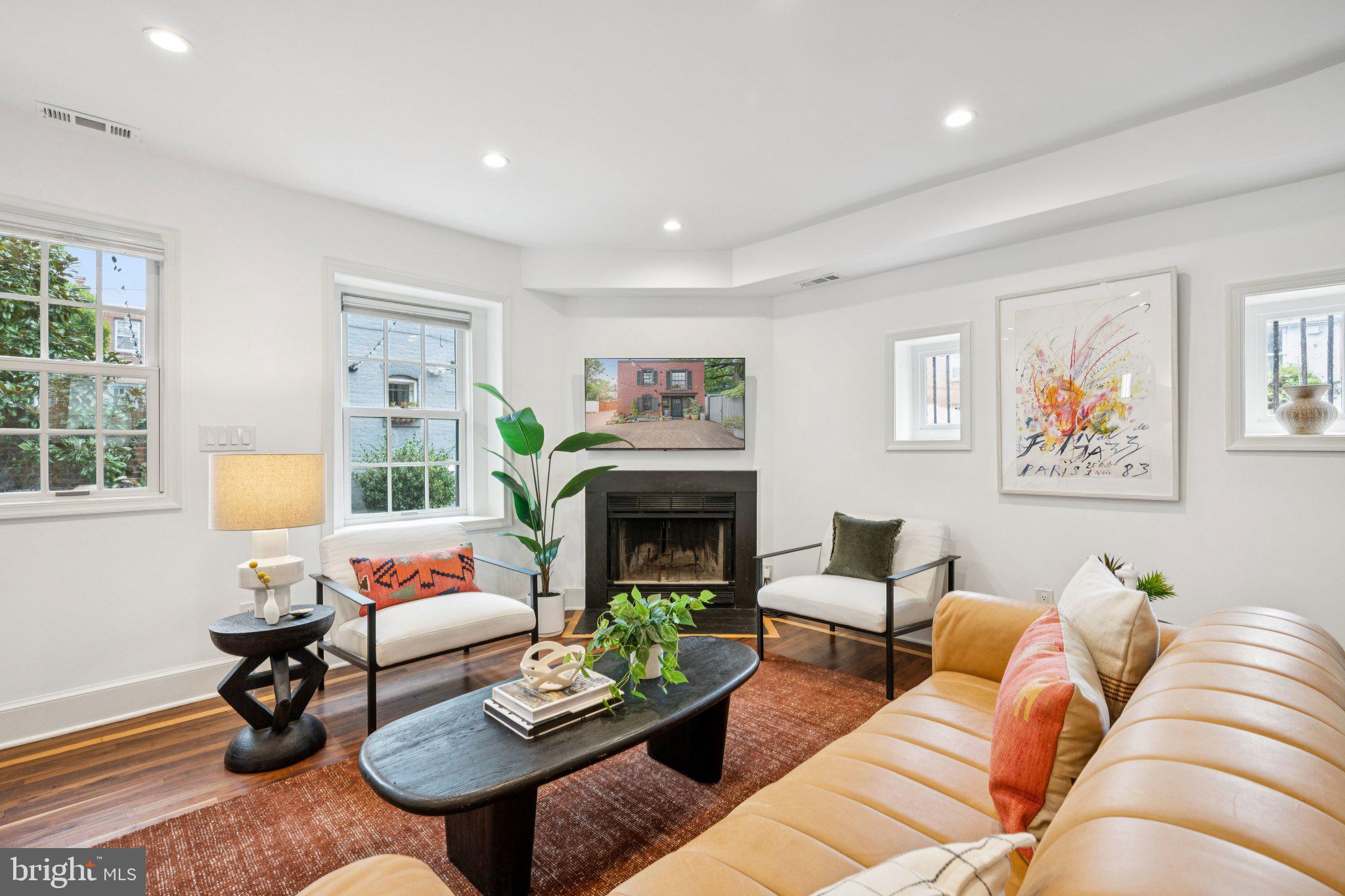 1 Derby Lane Washington, DC 20003 - Photo 12 of 33 a living room with furniture and a fireplace