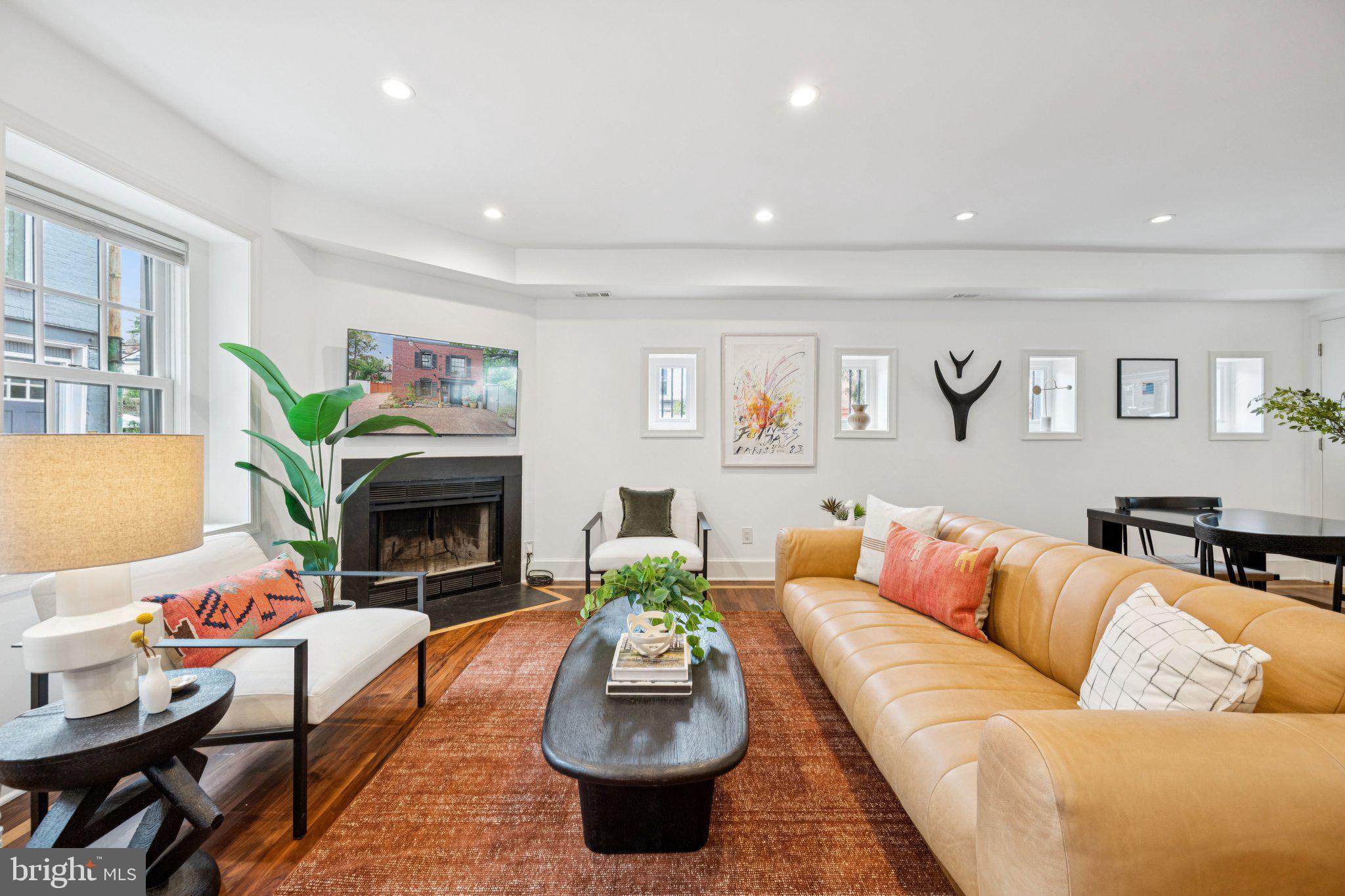 1 Derby Lane Washington, DC 20003 - Photo 13 of 33 a living room with furniture and a fireplace