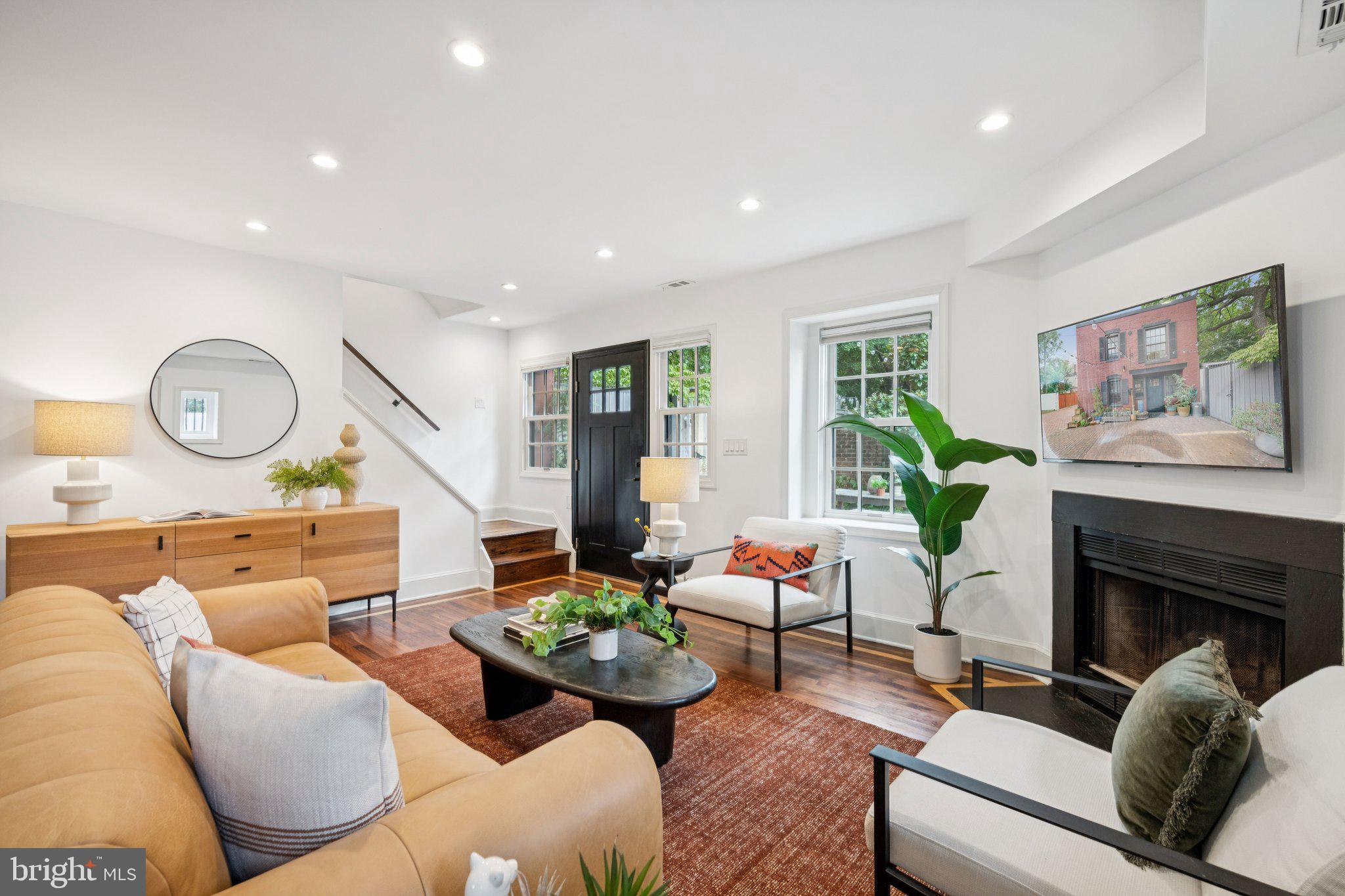 1 Derby Lane Washington, DC 20003 - Photo 14 of 33 a living room with furniture and a fireplace
