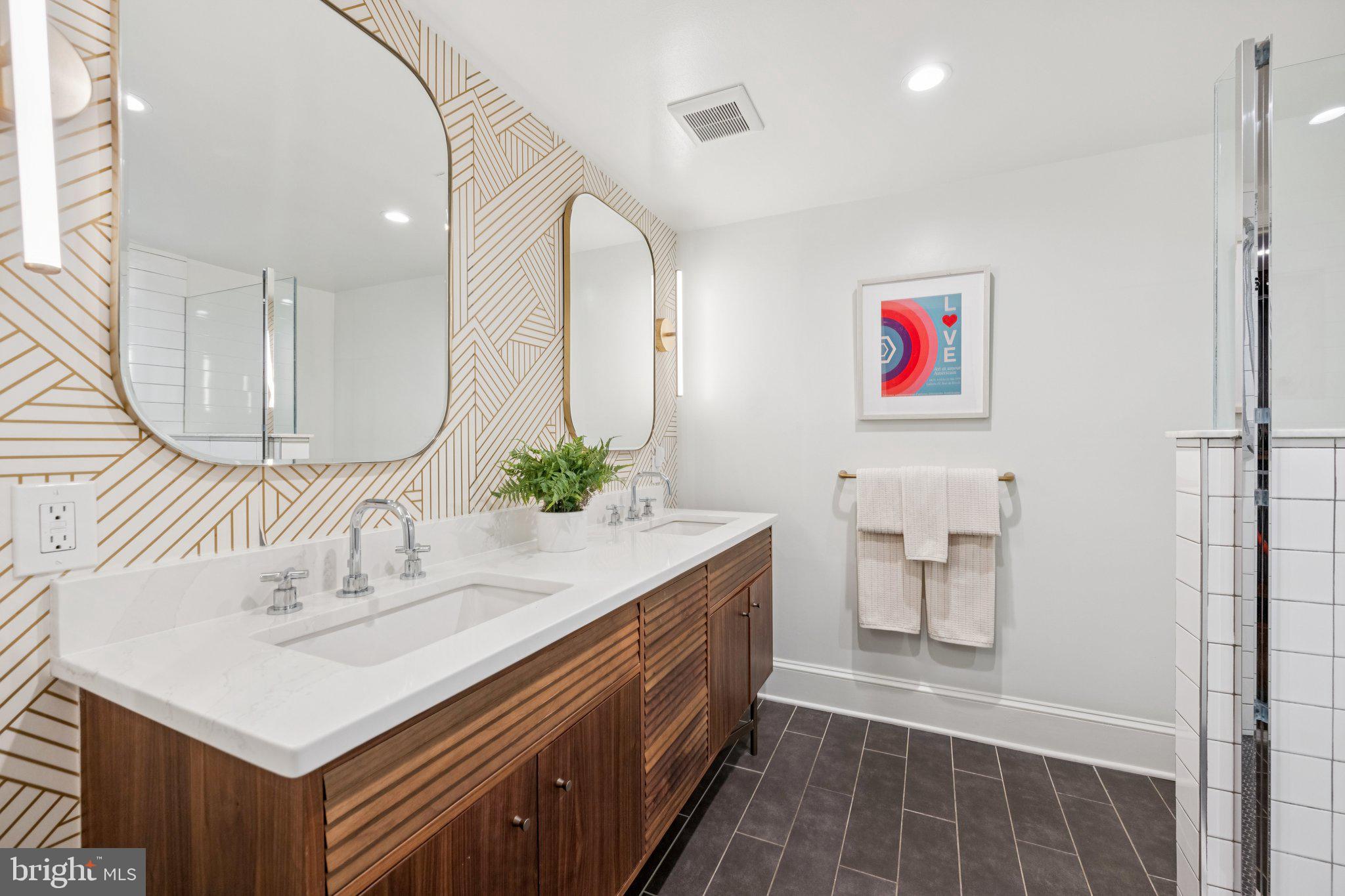 1 Derby Lane Washington, DC 20003 - Photo 20 of 33 a bathroom with a sink and a mirror