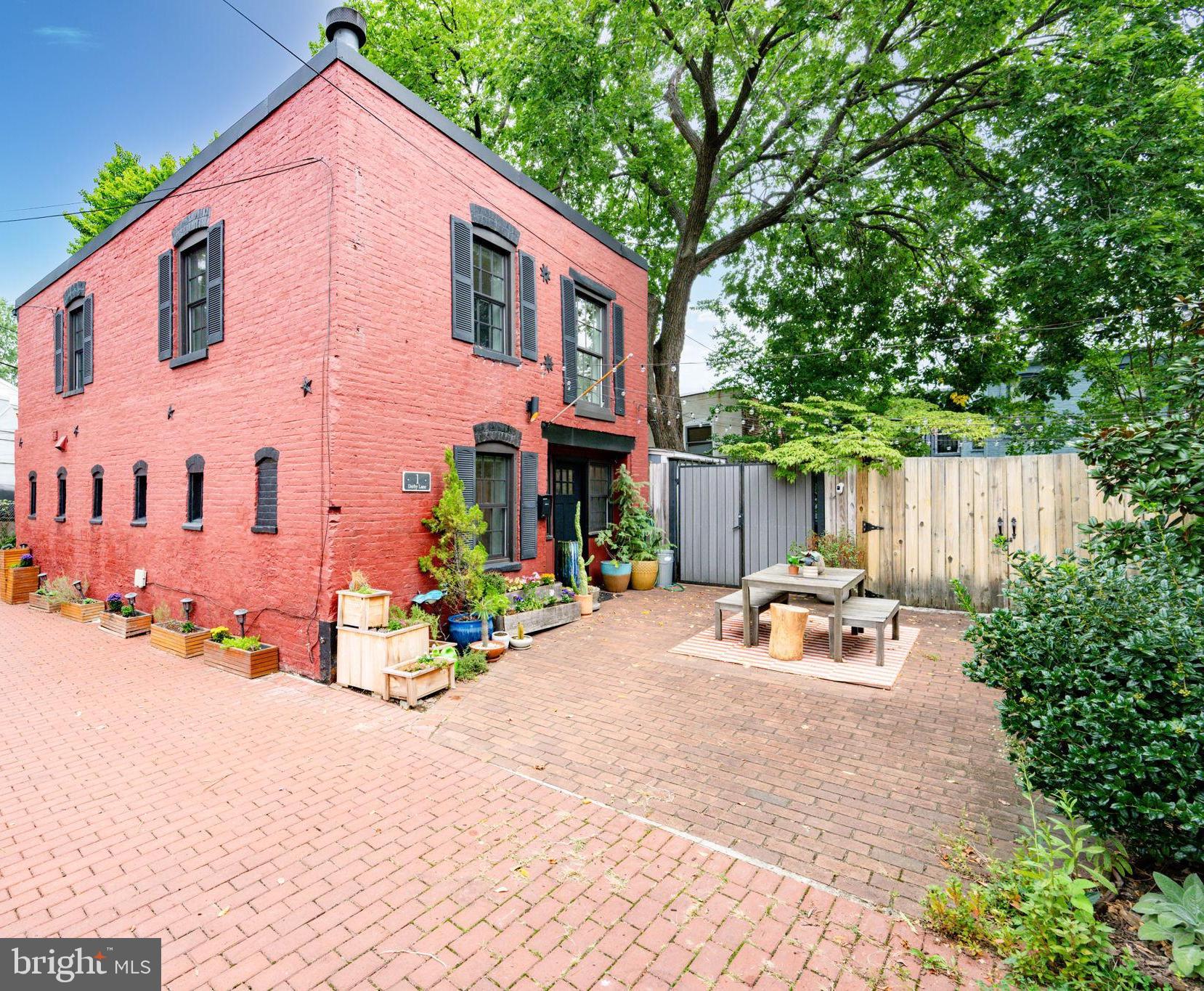 1 Derby Lane Washington, DC 20003 - Photo 2 of 33 a view of a house with backyard and sitting area