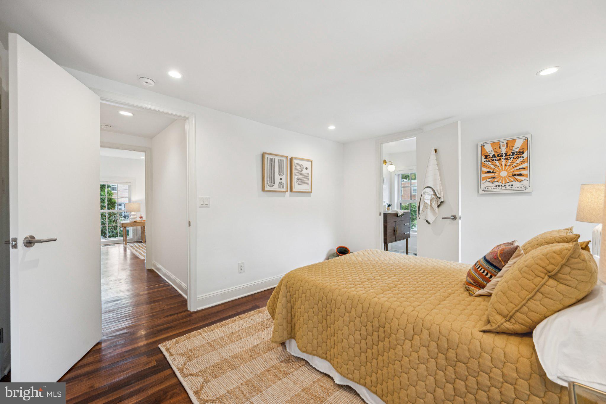 1 Derby Lane Washington, DC 20003 - Photo 25 of 33 a bedroom with a bed and painting on the wall