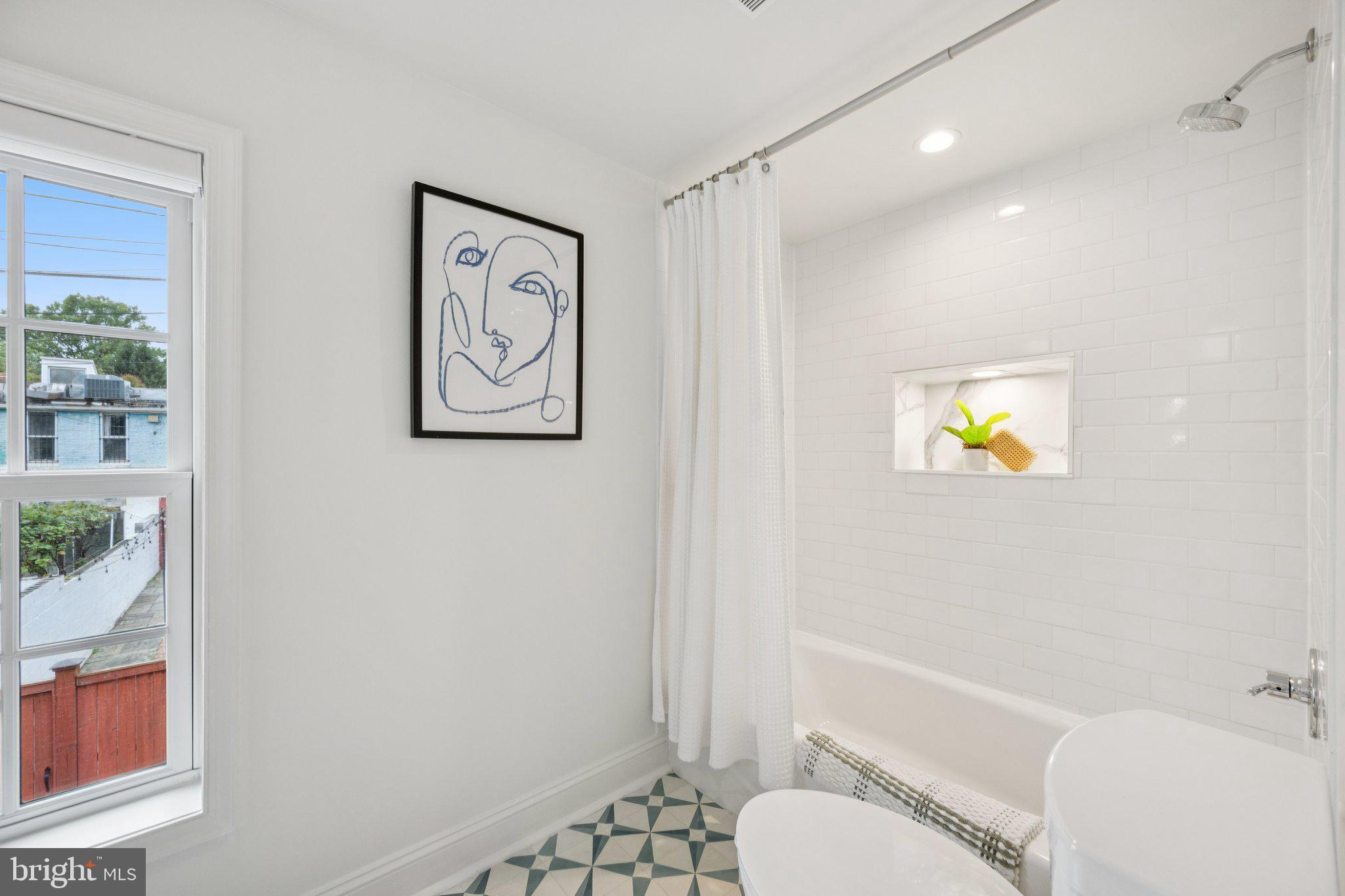 1 Derby Lane Washington, DC 20003 - Photo 27 of 33 a bathroom with a shower and a toilet