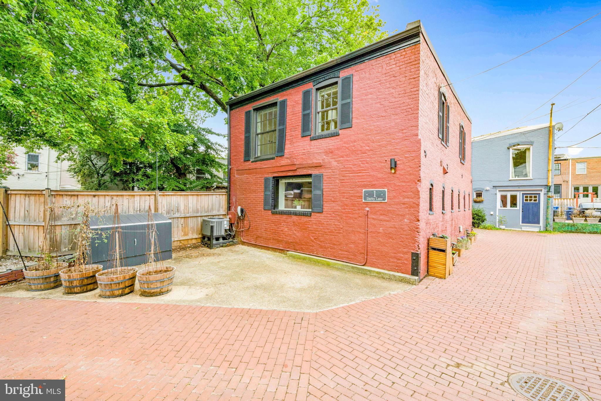 1 Derby Lane Washington, DC 20003 - Photo 30 of 33 a view of a house with a patio