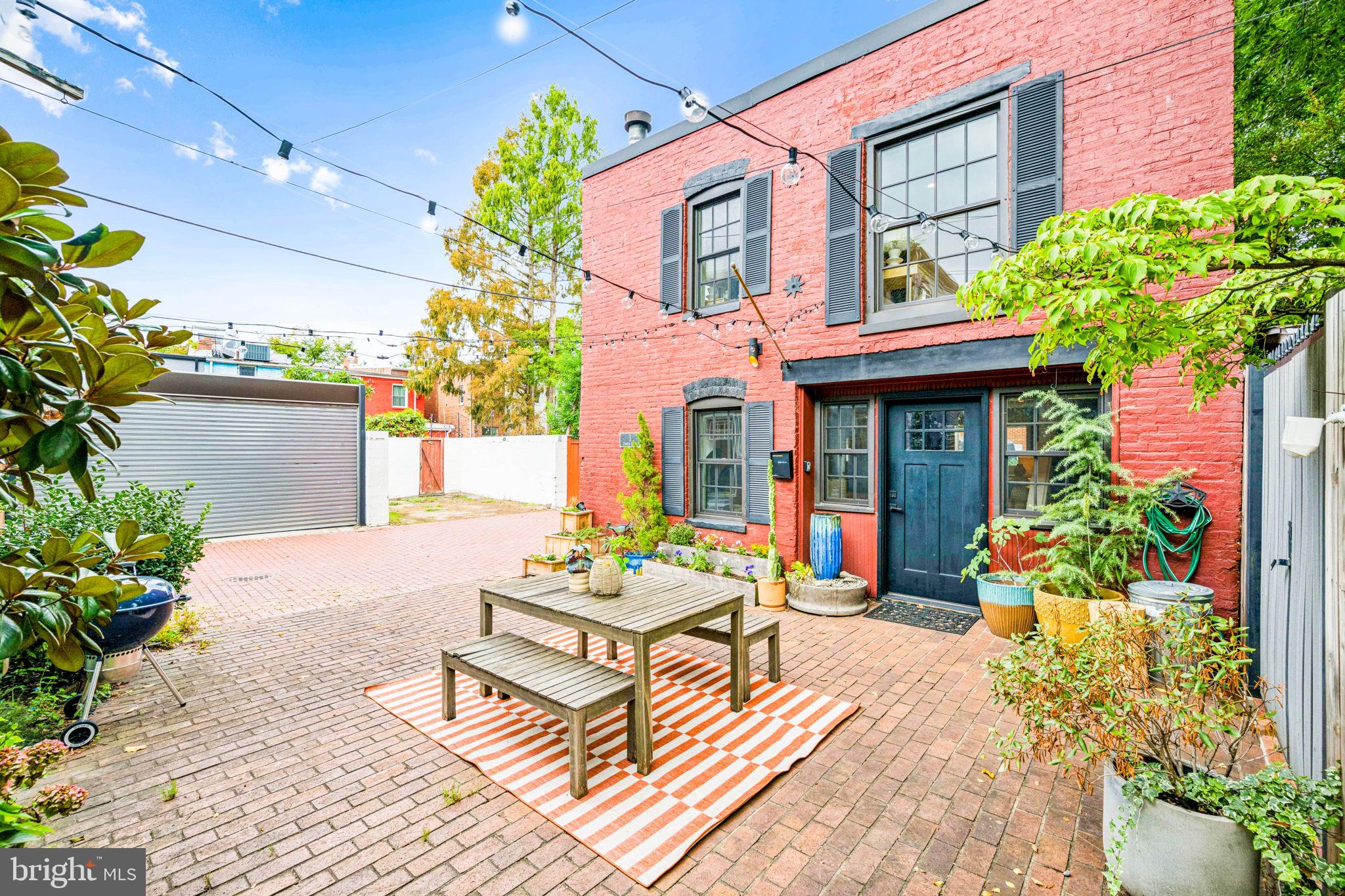 1 Derby Lane Washington, DC 20003 - Photo 3 of 33 a building outdoor space with patio furniture