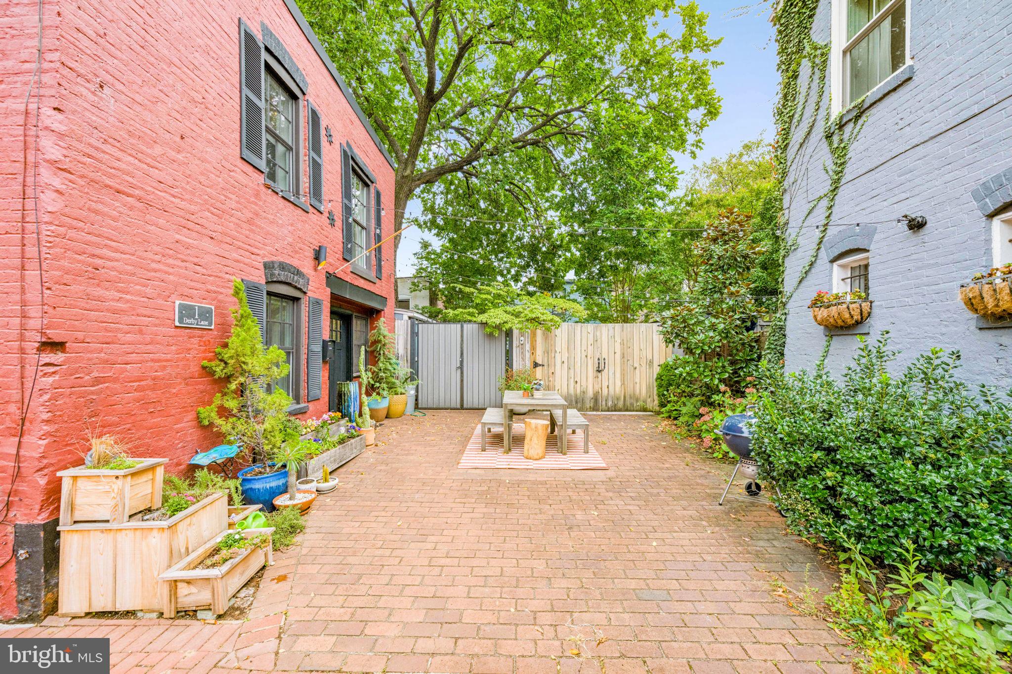 1 Derby Lane Washington, DC 20003 - Photo 33 of 33 a view of a chair and table in the backyard