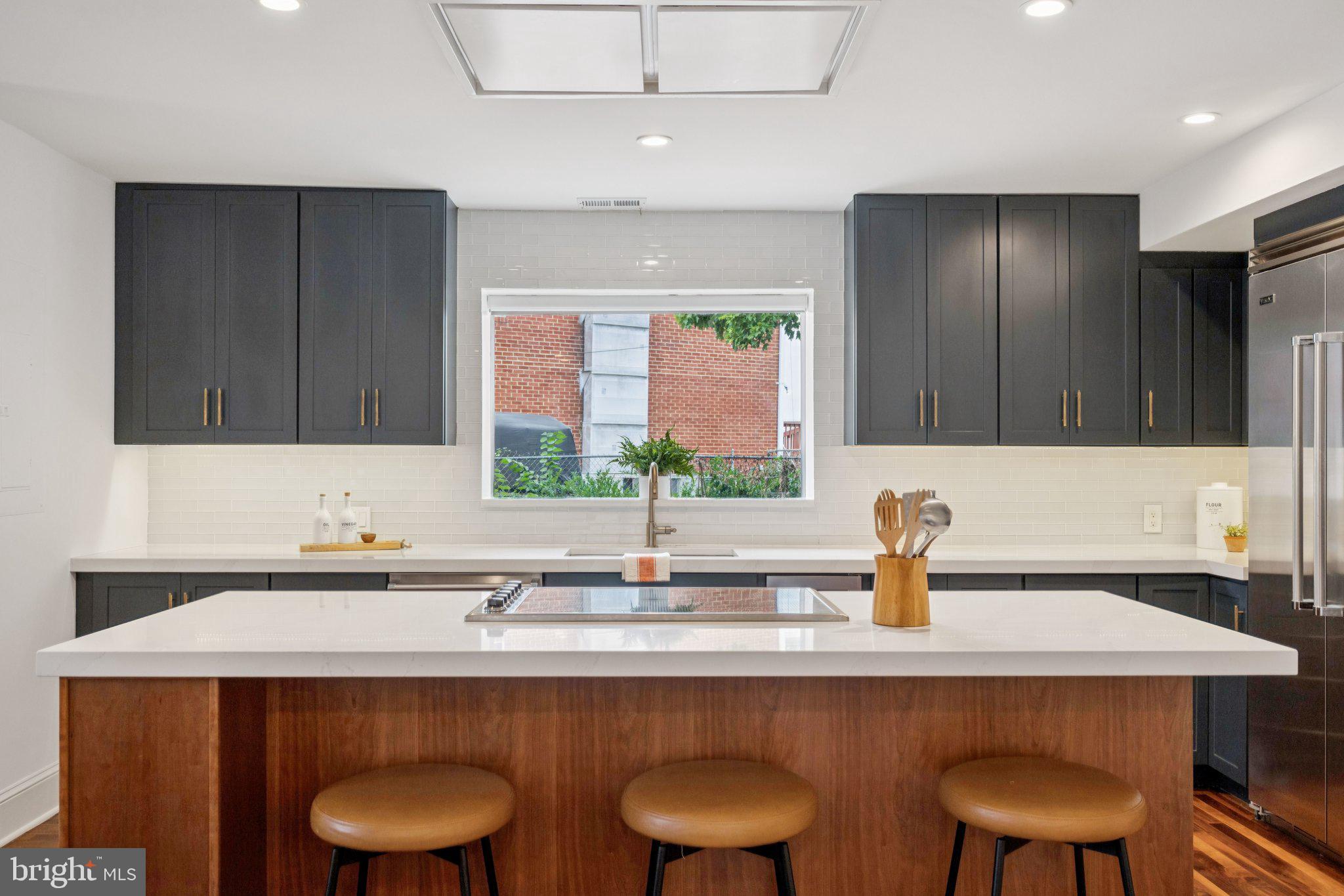 1 Derby Lane Washington, DC 20003 - Photo 8 of 33 a bathroom with a sink and a chair