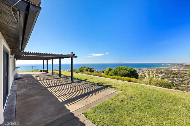 a view of a balcony with furniture