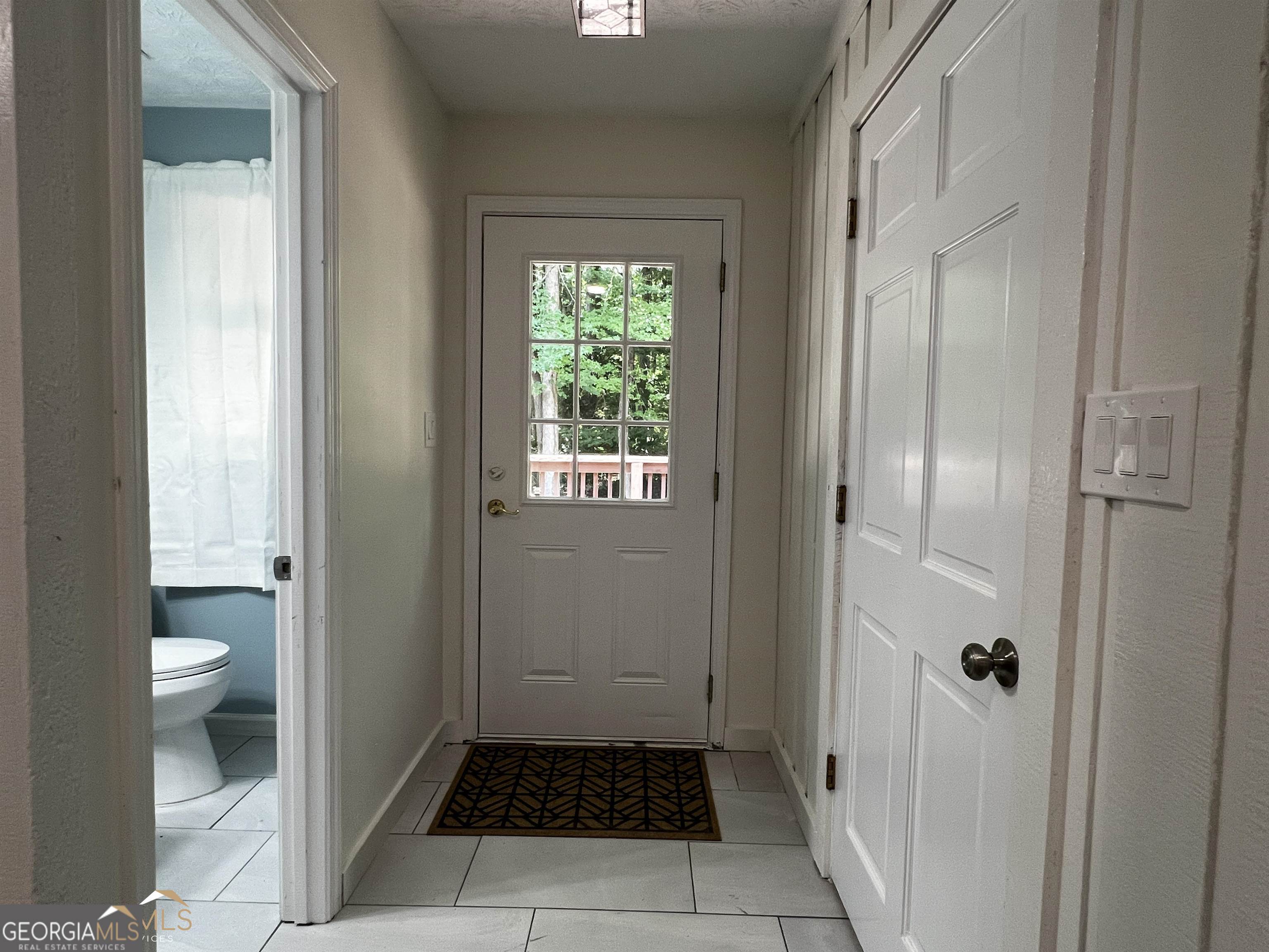 208 Swanson Ridge Peachtree City, GA 30269 - Photo 23 of 40 a bathroom with a toilet