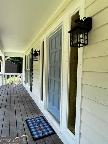 a view of a balcony with a door