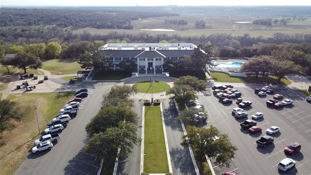 8820 Ravenswood Road Granbury, TX 76049 - Photo 13 of 17 an aerial view of a house with a garden