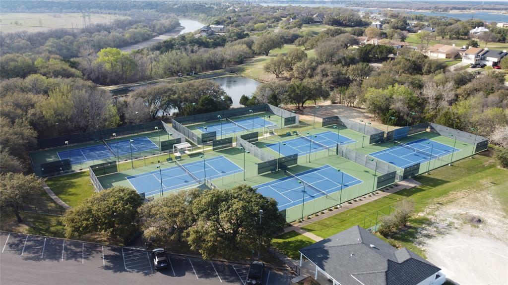 8820 Ravenswood Road Granbury, TX 76049 - Photo 14 of 17 an aerial view of a house with a yard