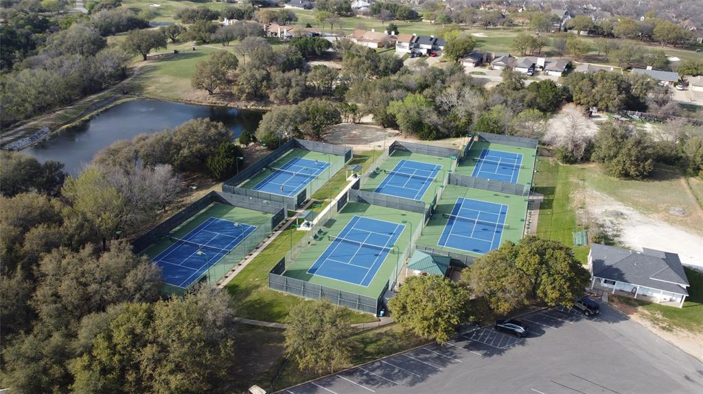 8820 Ravenswood Road Granbury, TX 76049 - Photo 15 of 17 an aerial view of residential house with outdoor space and swimming pool