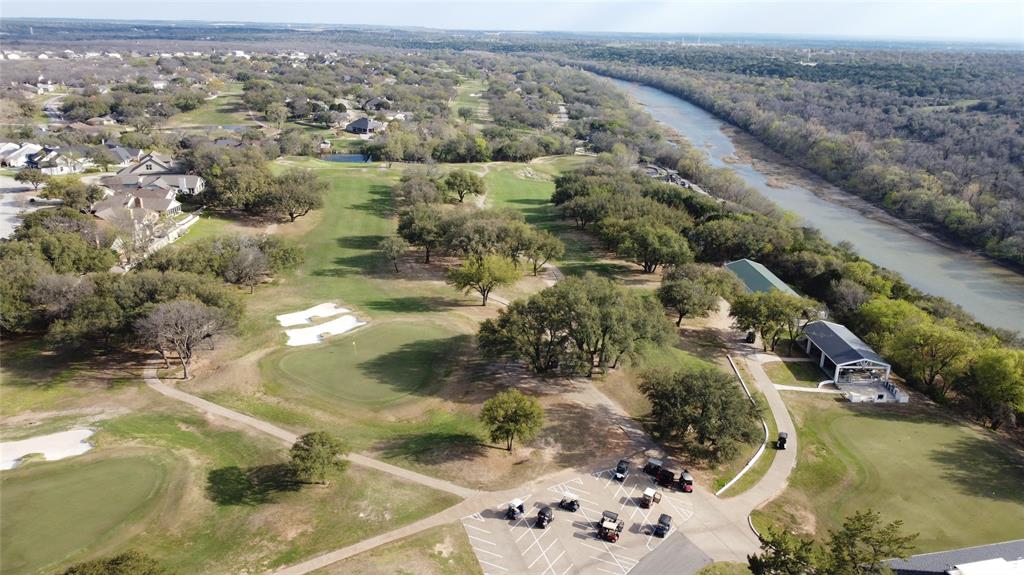 8820 Ravenswood Road Granbury, TX 76049 - Photo 16 of 17 an aerial view of residential houses with outdoor space