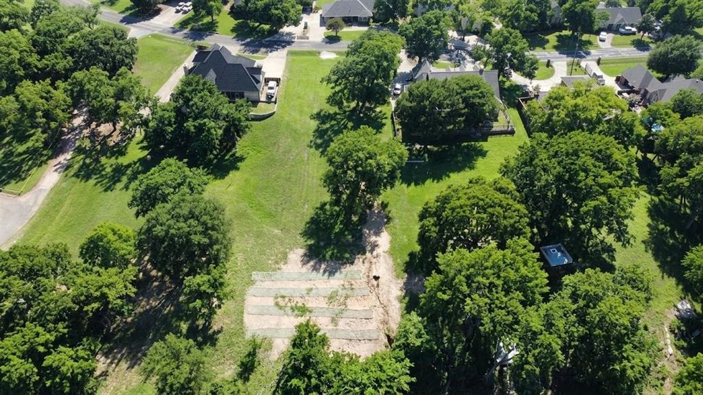 8820 Ravenswood Road Granbury, TX 76049 - Photo 4 of 17 an aerial view of residential house with outdoor space and trees all around