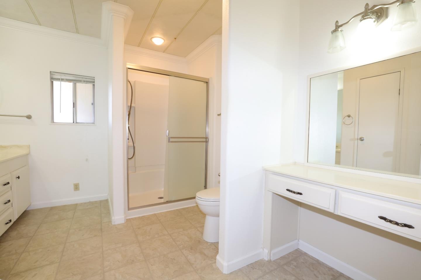 61 Quail Hollow Drive, Unit 61 San Jose, CA 95128 - Photo 25 of 36 a bathroom with a shower and a toilet