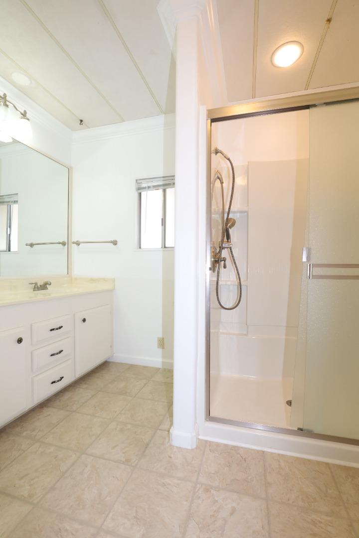 61 Quail Hollow Drive, Unit 61 San Jose, CA 95128 - Photo 27 of 36 a bathroom with a shower