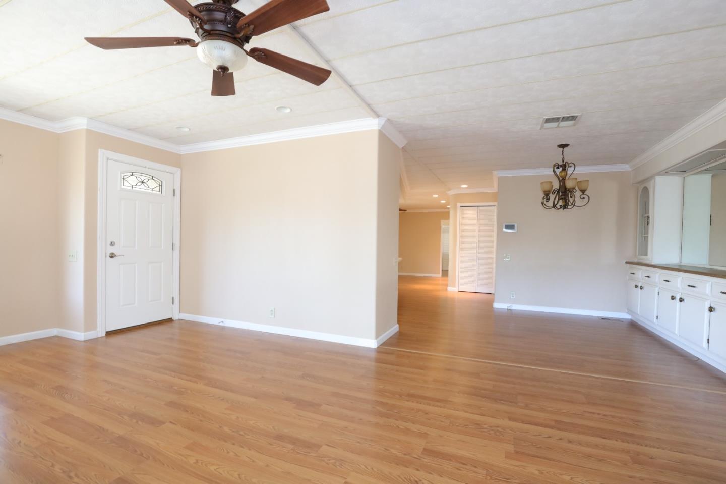 61 Quail Hollow Drive, Unit 61 San Jose, CA 95128 - Photo 29 of 36 wooden floor in an empty room with a window