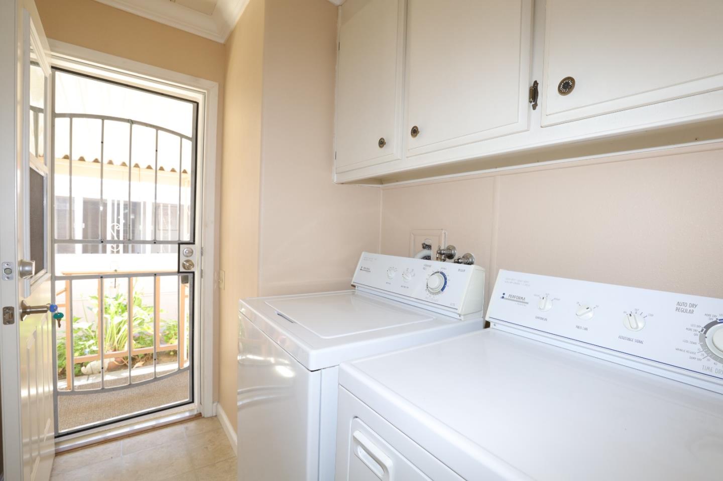 61 Quail Hollow Drive, Unit 61 San Jose, CA 95128 - Photo 34 of 36 a utility room with dryer and washer