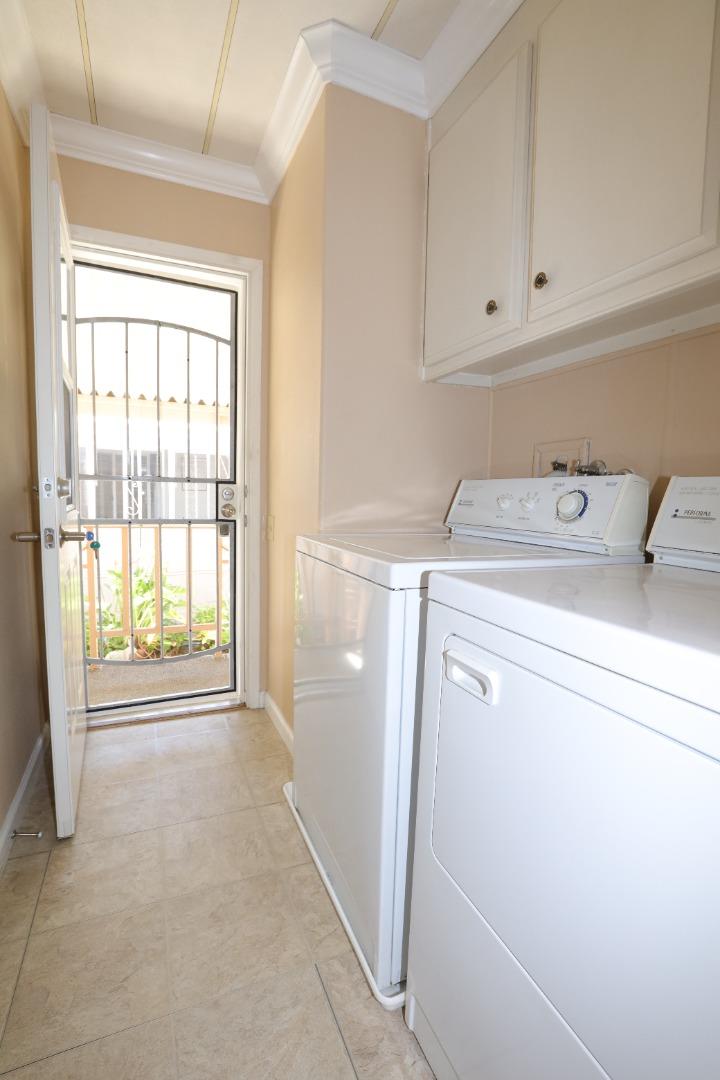 61 Quail Hollow Drive, Unit 61 San Jose, CA 95128 - Photo 35 of 36 a utility room with dryer and washer